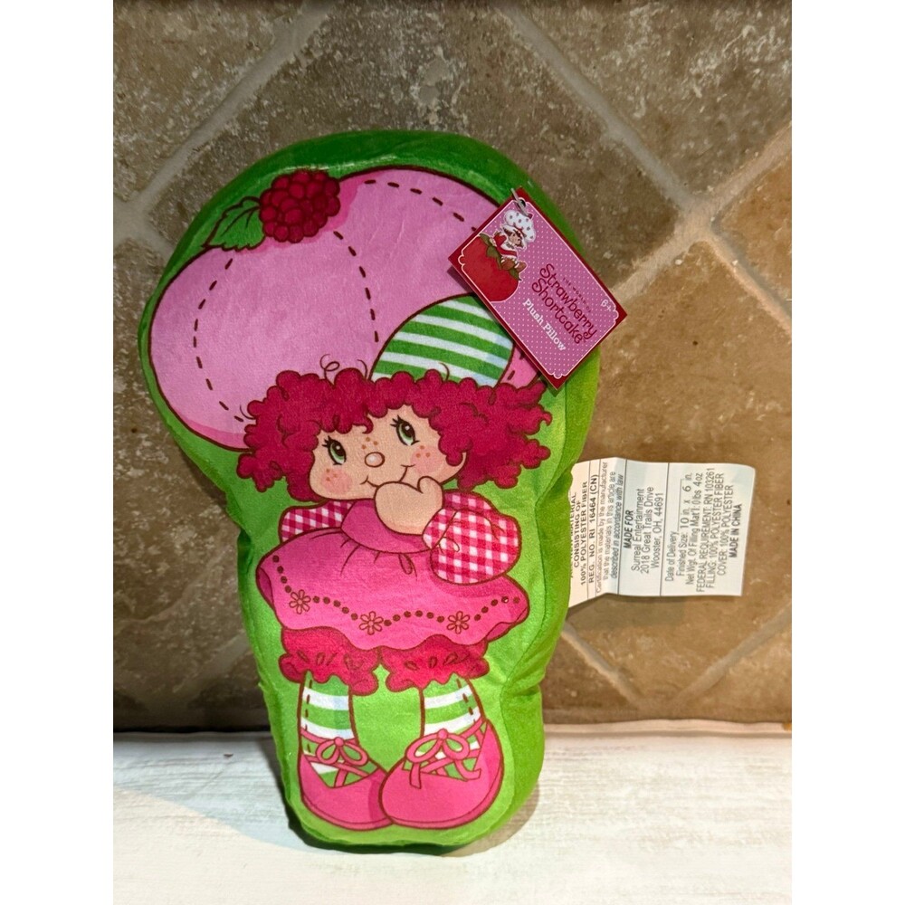 Adorable small Strawberry Shortcake figure shaped plush pillow with tags.
